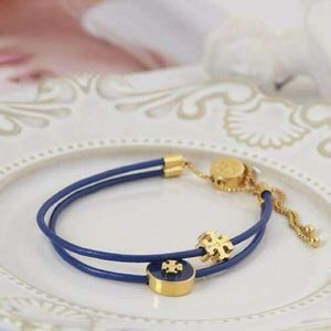 NWOT Tory Burch Gold, Blue leather Adjustable Slider Bracelet